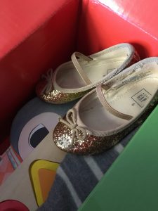 Gold baby shoes